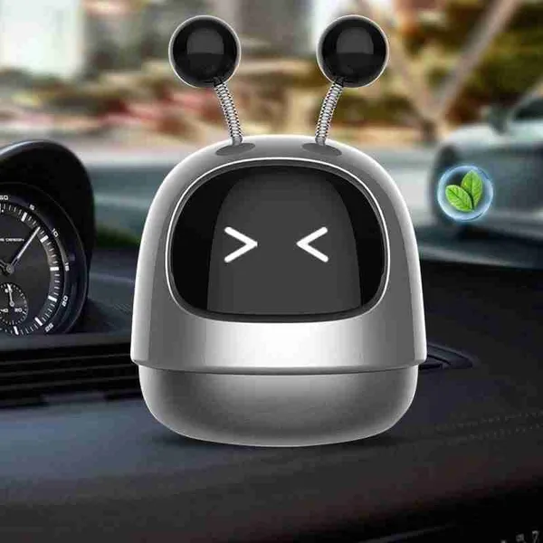 Mini_Robot_Car_Perfume_“_Silver_Dashboard_Decoration_Air_Freshener_|_Stylish_Robot_Design_With_Long-Lasting_Fragrance_For_Car_Interior_|_Compact,_Eye-Catching_&_Refreshing_Scent_Diffuser