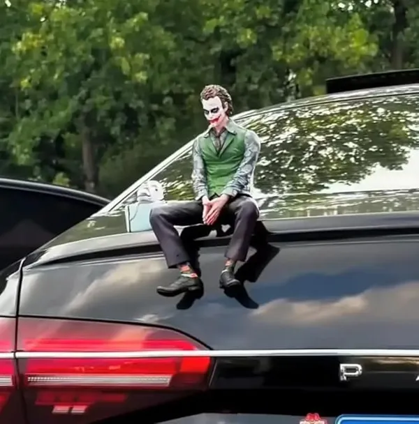Joker_Style_Car_Sitting_Figure_Medium–_Unique_Dashboard_or_Hood_Decoration_for_Stylish_Car_Lovers,_Durable_Resin_Build_(Dark_Green_&_Purple)