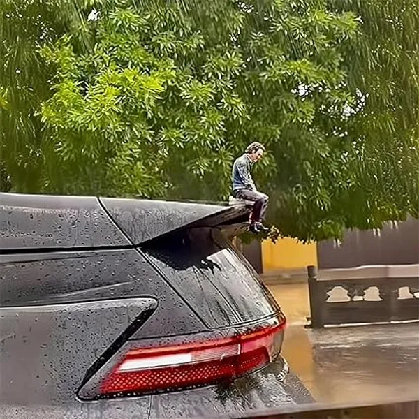 Joker_Style_Car_Sitting_Figure_Medium–_Unique_Dashboard_or_Hood_Decoration_for_Stylish_Car_Lovers,_Durable_Resin_Build_(Dark_Green_&_Purple)