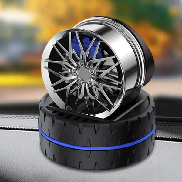 Rotating_Car_Dashboard_Perfume_Diffuser_–_Spinning_Alloy_Wheel_Design_with_Long-Lasting_Fragrance_Core_(Silver)