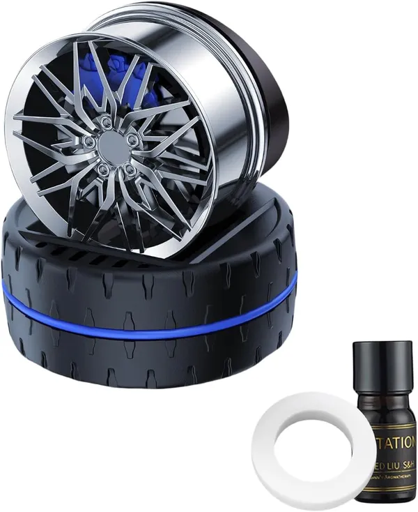 Rotating_Car_Dashboard_Perfume_Diffuser_–_Spinning_Alloy_Wheel_Design_with_Long-Lasting_Fragrance_Core_(Silver)