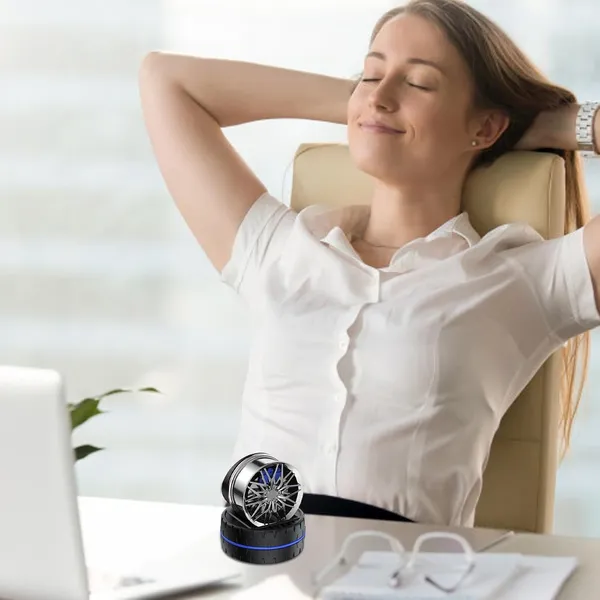 Rotating_Car_Dashboard_Perfume_Diffuser_–_Spinning_Alloy_Wheel_Design_with_Long-Lasting_Fragrance_Core_(Silver)