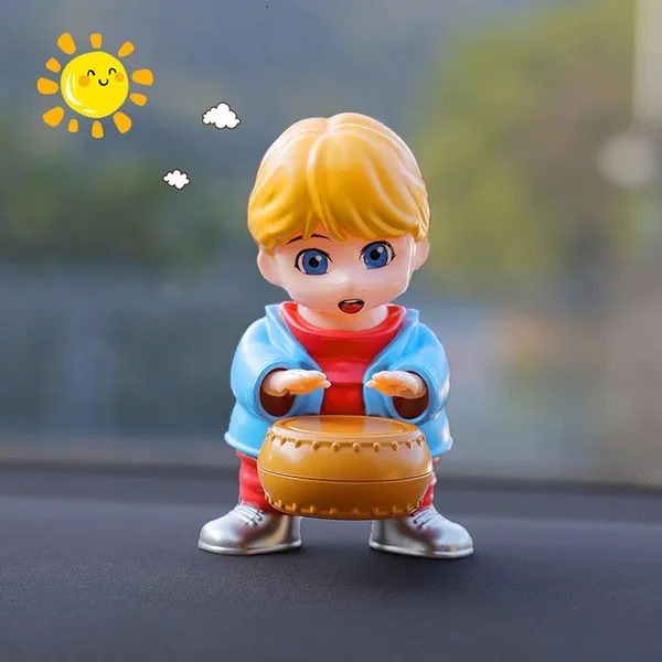 Swinging_Drummer_Boy_Dashboard_Toy_Air_Freshner_–_Moving_Head_Figurine_with_Built-in_Fragrance_Diffuser_(Yellow_&_Blue)