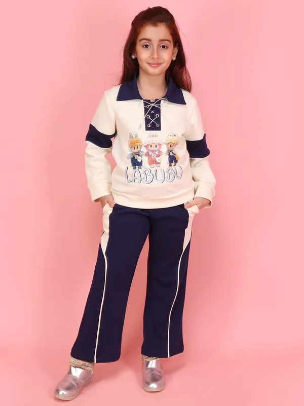 Cutecumber_Girls_Cream_&_Navy_Blue_Neoprene_Top_&_Pant_Co-Ord_Set_Graphic_&_Side_Stripe_Pants_�_Stylish_Winter_Casual_&_Travel_Wear_Outfit_for_Kids_&_Baby_Girls_(Age_1�15_Yrs)