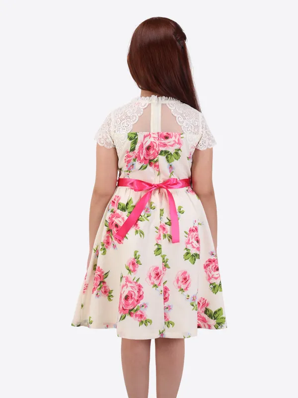 charming_cream_and_pink_floral_printed_fit-and-flare_dress_for_girls