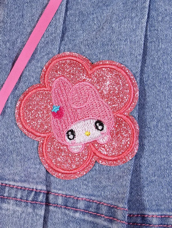 Girls_Blue_Denim_Pleated_Skirt_with_Lace-Up_Bow_Detail_Cute_Applique_Patch_Design