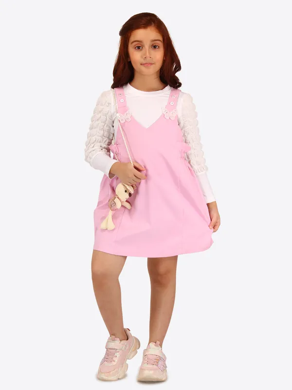 Pink_dungaree_dress_with_bubble_sleeve_t-shirt