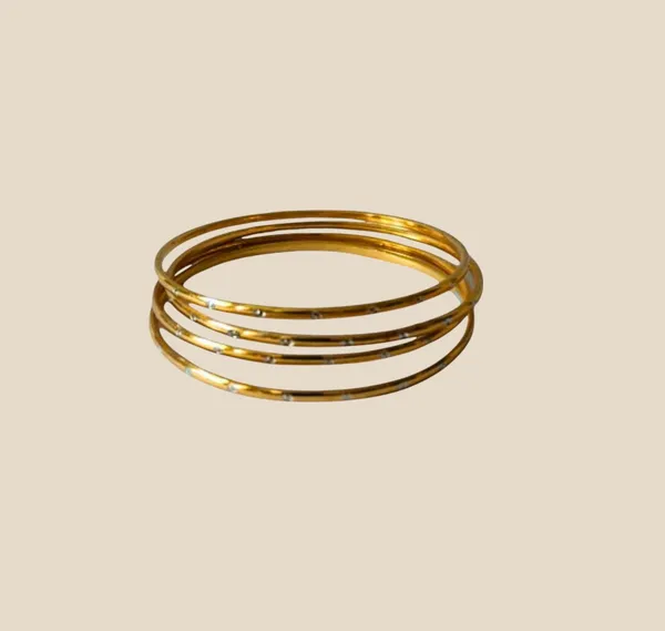 Elegant_Gold_Bangles_with_Sparkling_Crystals