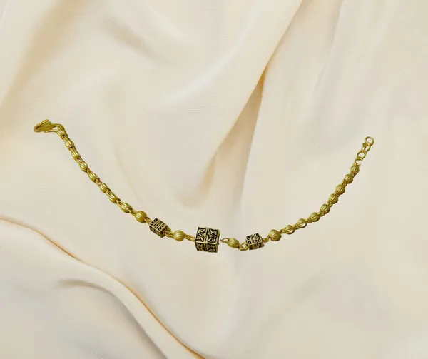 Artisan_Gold_Tone_Bracelet_with_Antique_Inspired_Cube_Accents