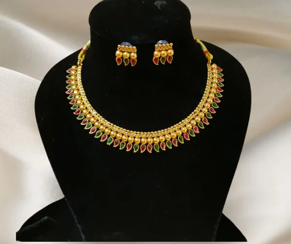 Classic_Gold_Plated_Necklace_&_Earrings_with_Ethnic_Design