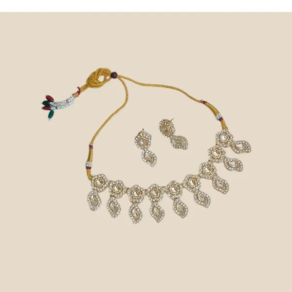 Dazzling_Gold-Tone_Teardrop_Necklace_and_Earrings_Set_with_Sparkling_Accents