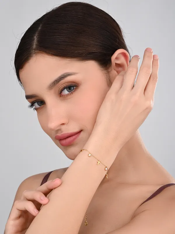 Delicate_Gold_Cross_and_Crystal_Charm_Bracelet