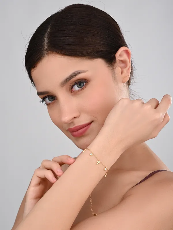 Delicate_Gold_Cross_and_Crystal_Charm_Bracelet