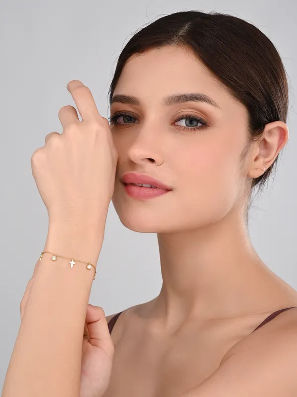 Delicate_Gold_Cross_and_Crystal_Charm_Bracelet
