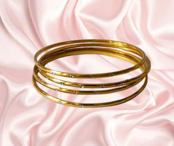 Elegant_Gold_Bangles_with_Sparkling_Crystals