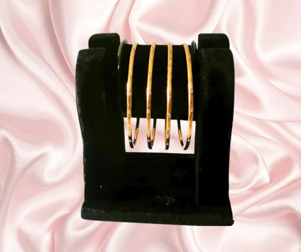 Elegant_Gold_Bangles_with_Sparkling_Crystals