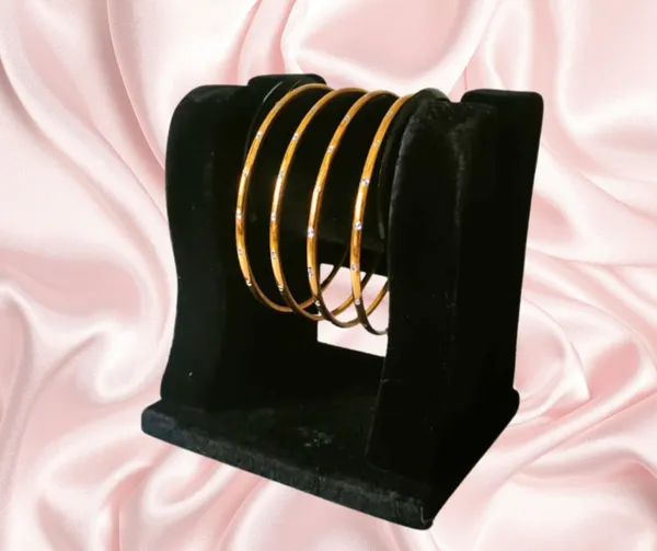 Elegant_Gold_Bangles_with_Sparkling_Crystals