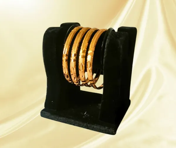 Elegant_Gold-Plated_Bangle_Set_with_Intricate_Detailing_(Set_of_4)