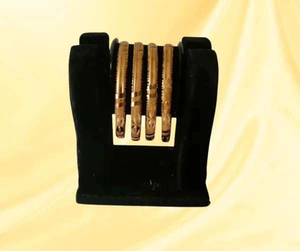 Elegant_Gold-Plated_Bangle_Set_with_Intricate_Detailing_(Set_of_4)