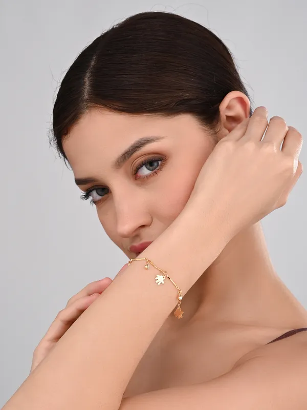 Elegant_Gold-Tone_Charm_Bracelet_with_Sparkling_Accents_and_Hand_Charms