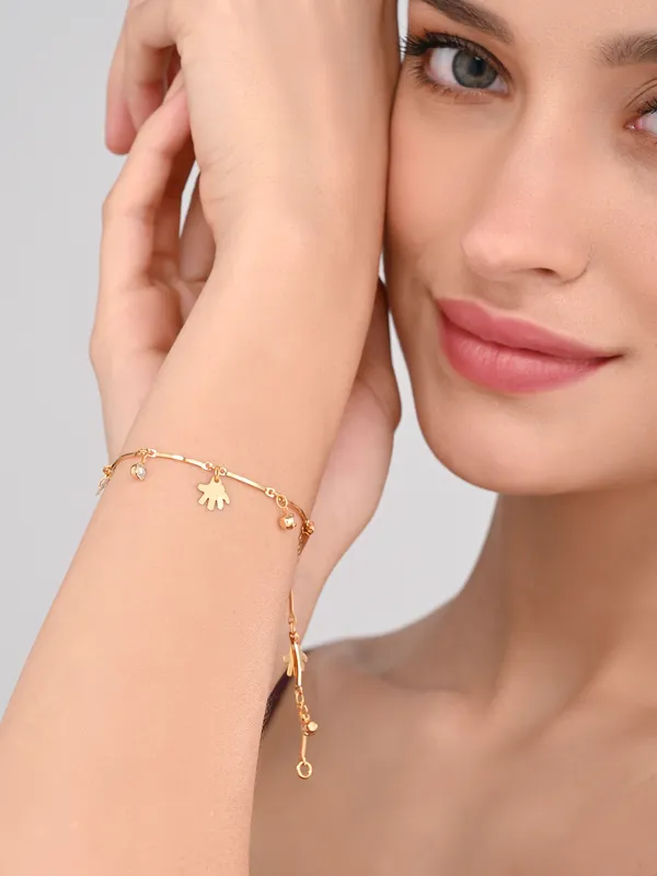 Elegant_Gold-Tone_Charm_Bracelet_with_Sparkling_Accents_and_Hand_Charms