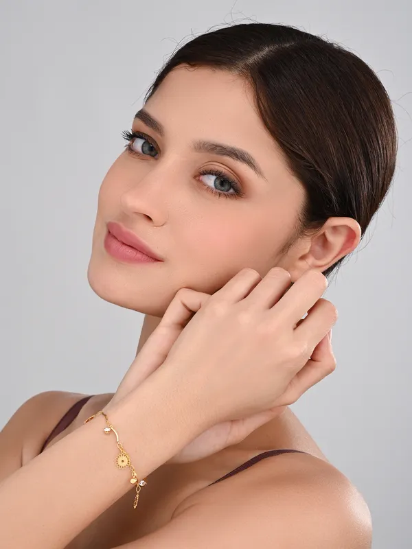 Elegant_Gold-Tone_Charm_Bracelet_with_Sparkling_Crystal_Accents
