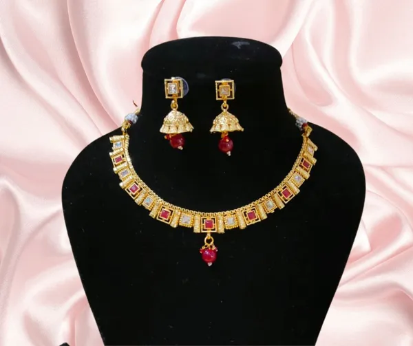 Elegant_Gold-Tone_Necklace_&_Jhumka_Earring_Set_with_Ruby_Accents