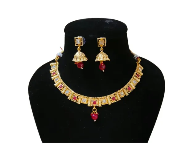 Elegant_Gold-Tone_Necklace_&_Jhumka_Earring_Set_with_Ruby_Accents