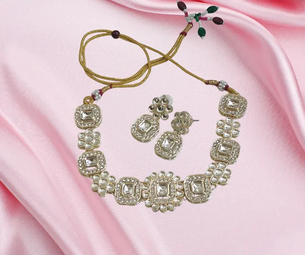 Elegant_Gold-Tone_Necklace_and_Earrings_Set_with_Sparkling_Clear_Gemstones