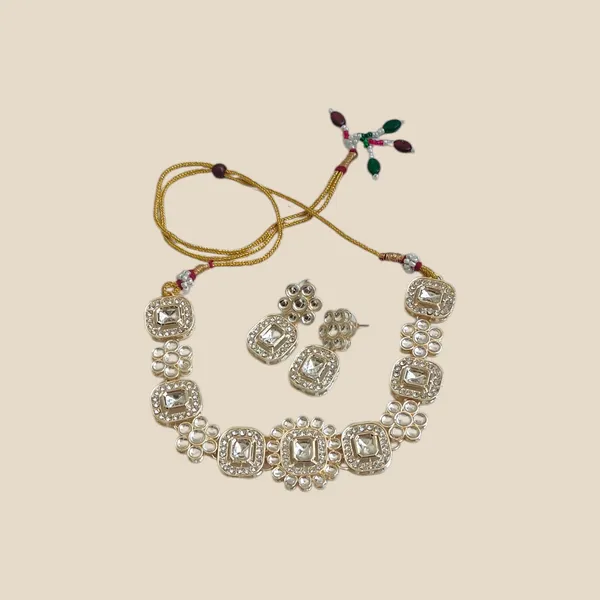 Elegant_Gold-Tone_Necklace_and_Earrings_Set_with_Sparkling_Clear_Gemstones