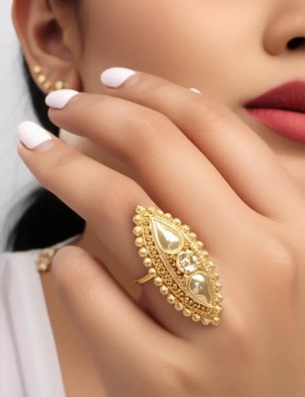Elegant_Gold-Toned_Statement_Ring_with_Intricate_Detailing