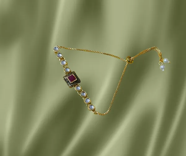 Elegant_Red_Gemstone_Bolo_Bracelet_with_Crystal_Accents