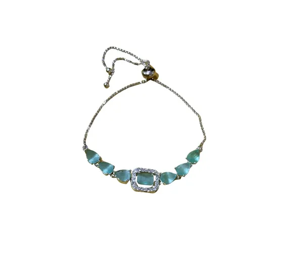 Elegant_Silver-Tone_Bolo_Bracelet_with_Soft_Green_Gemstones_and_Crystal_Accents
