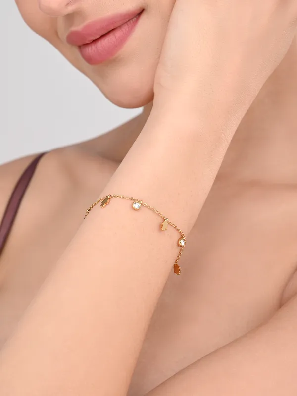 Minimalist_18K_Gold_Plated_Ankle_Chain_with_Hamsa_and_Cubic_Zirconia_Charms