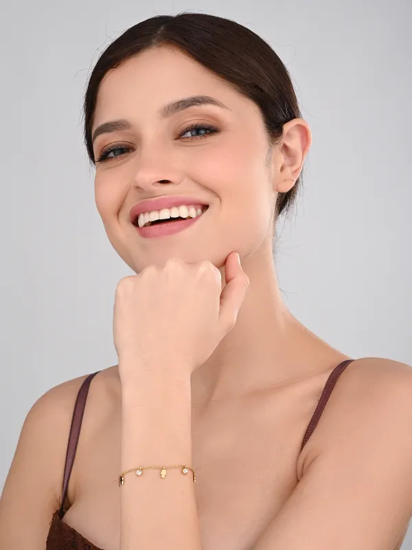 Minimalist_18K_Gold_Plated_Ankle_Chain_with_Hamsa_and_Cubic_Zirconia_Charms