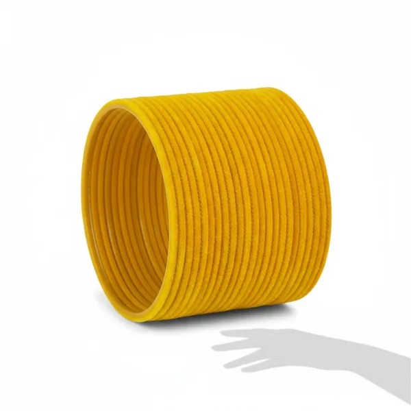 Radiant_Elegance:_Woman_in_Traditional_Saree_and_Vibrant_Yellow_Bangles