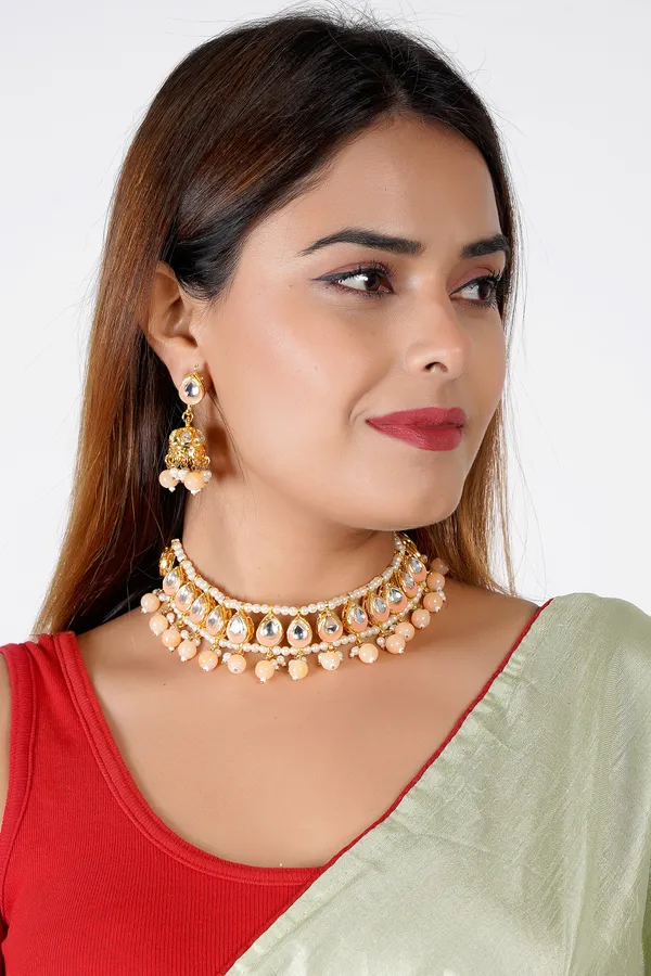 Stunning_Indian_Bridal_Kundan_Set_with_Peach_Beads_and_Pearls