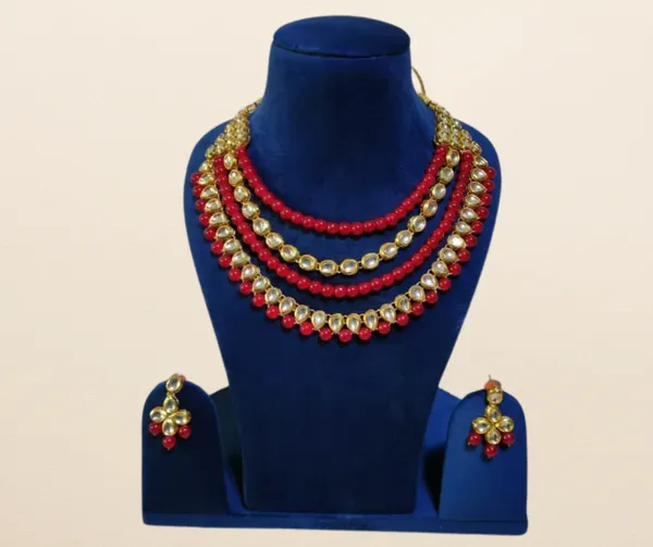 Elegant_Layered_Kundan_and_Red_Bead_Necklace_Set