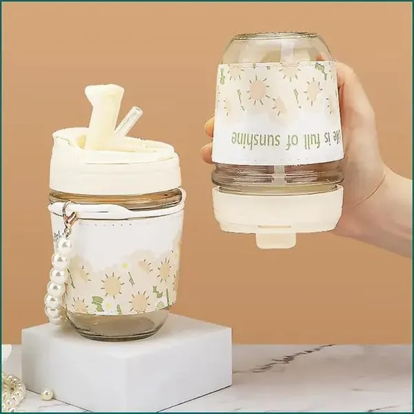 Glass_Coffee_Mug_with_Straw_with_Pearl_Chain_Belt_&_Leather_Grip_Sipper_Tumbler_Mugs_with_Lid_Pack_of_1-350_ML_Travel_Mug_for_Drinking_Glass,_Milk_Mug,Lemon_Tea,Water_Juice_Cup_(CM_-_29)