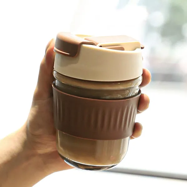 Glass_Travel_Mug_with_Straw_Silicone_Band_and_Leak-Proof_Sipper_Mugs_with_Lid_Pack_of_1-300_ML_CoffeeMug_for_Drinking_Glass,_Milk_Mug,Lemon_Tea,Water_Juice_Cup_(CM_-_20)