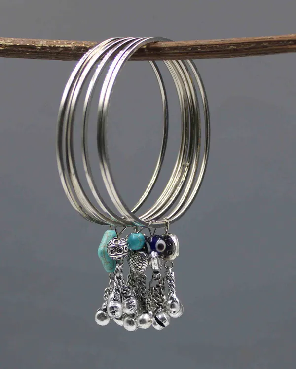 Set_of_6_Oxidized_Silver_Bangles_with_Assorted_Charms___Moon,_Bird,_Heart,_and_Beads