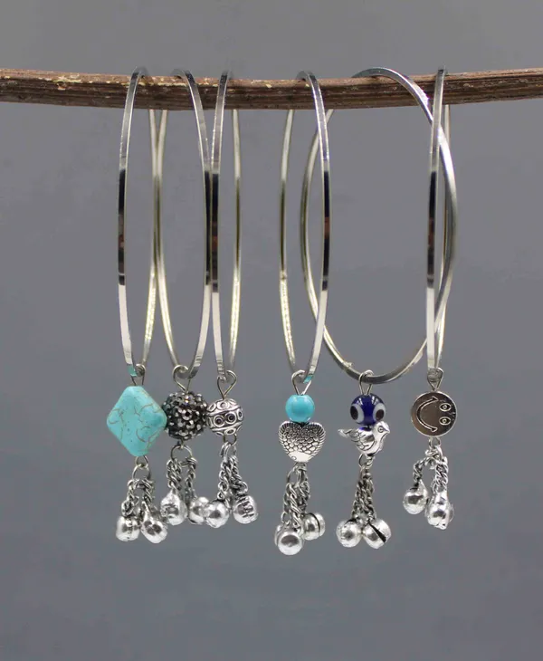 Set_of_6_Oxidized_Silver_Bangles_with_Assorted_Charms___Moon,_Bird,_Heart,_and_Beads