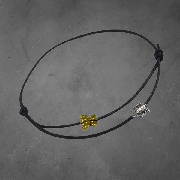 Black_Thread_Anklet_with_Oxidised_Gold_BUTERFLY_+_silver_Tartoise_for_Girls_Cotton_Dori_Anklet