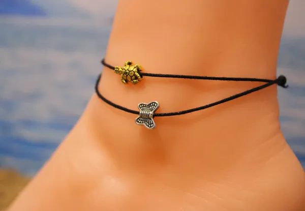 Black_Thread_Anklet_with_Oxidised_Silver_BUTERFLY_+_Gold_Tartoise_for_Girls_Cotton_Dori_Anklet