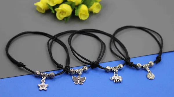 Two_layer_Thread_with_difernet_Hanging_set_of_4_Cotton_Dori_Anklet__(Pack_of_4)