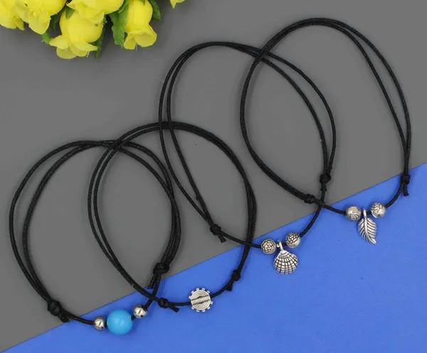 Boho_Beach_Vibe_Adjustable_Black_Thread_Anklet_Set___Pack_of_4_with_Shell,_Bead___Feather_Charms