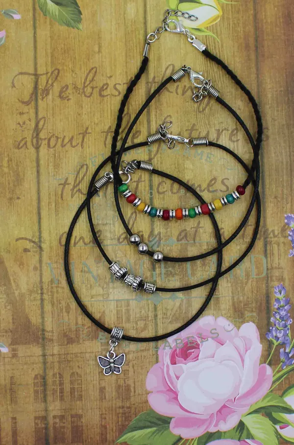 Boho_Vibes_Black_Thread_Anklet_Set___Pack_of_4_Stylish_Charm_Anklets
