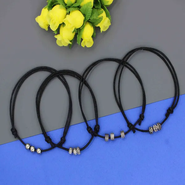 Minimal_Tribal_Charm_Anklet_Set___4_pcs_Black_Thread_with_Beaded_Accents