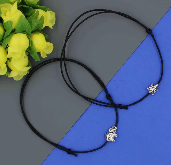 Tribal_Spirit_Anklet_Duo___Adjustable_Black_Cord_with_Elephant___Turtle_Charms_(Set_of_2)