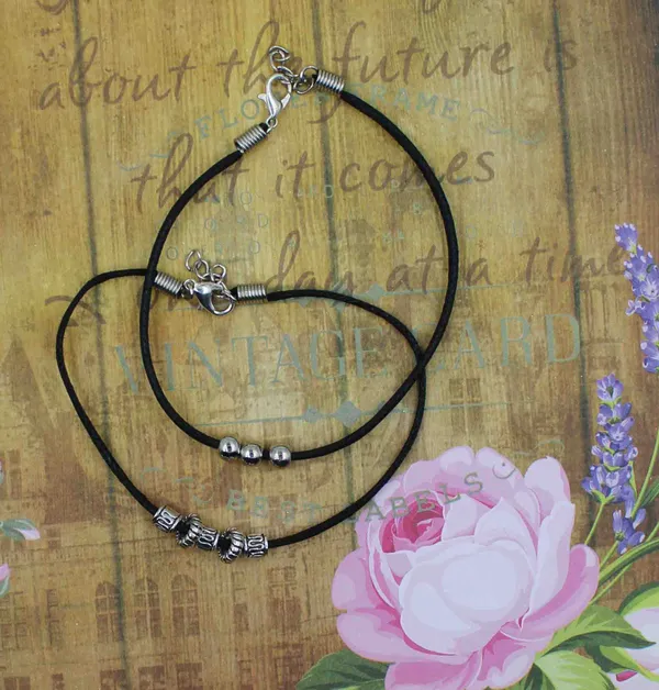 Twin_Charm_Black_Thread_Anklet_Set___Minimalist_Silver_Bead_Edition_(Pack_of_2)
